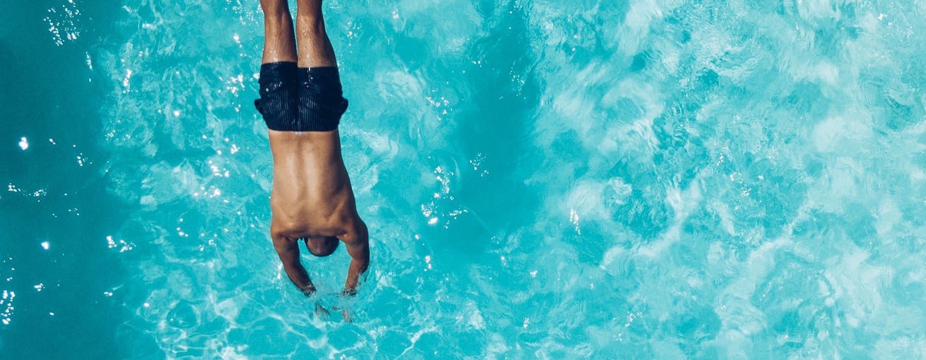 a man swimming in the water